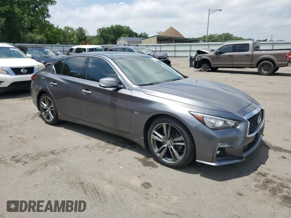 2019 Infiniti Q50 Luxe with VIN JN1EV7AR7KM591889, listed as a Copart auction lot 61304425 with 73,712 mi miles and Salvage title. Bid and sale history available at DreamBid. Image 4.