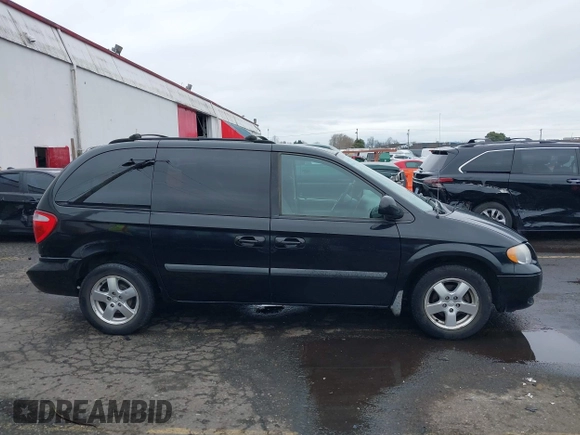 2007 Dodge Caravan SXT with VIN 1D4GP45R87B161237, listed as a IAAI auction lot 41594127 with 154,508 mi miles and . Bid and sale history available at DreamBid. Image 13.