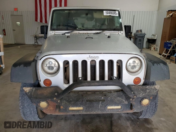 2009 Jeep Wrangler Unlimited X with VIN 1J4GZ39159L711944, listed as a Copart auction lot 50406045 with 211,099 mi miles and Clean Title. Bid and sale history available at carsss.com. Image 5.