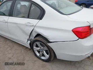2014 BMW 3 Series 320i with VIN WBA3B1G58ENS80160, listed as a IAAI auction lot 42029951 with 97,306 mi miles. Bid and sale history available at carsss.com. Image 6.