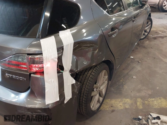2014 Lexus CT 200h with VIN JTHKD5BH6E2189390, listed as a IAAI auction lot 41950039 with 127,943 mi miles and . Bid and sale history available at DreamBid. Image 6.