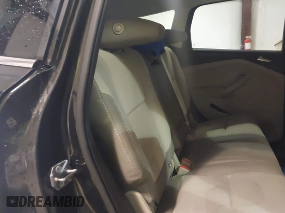 2014 Ford Escape SE z VIN 1FMCU9GX6EUB69007, wystawiony jako IAAI lot #41710065 z przebiegiem 113 080 mil mil oraz . Historia ofert i sprzedaży dostępna na DreamBid. Obrazek 8.