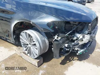 2019 BMW 5 Series 530i with VIN WBAJA5C50KWW02304, listed as a IAAI auction lot 42338536 with 29,049 mi miles and . Bid and sale history available at DreamBid. Image 6.