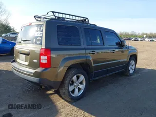 2016 Jeep Patriot High Altitude Edition with VIN 1C4NJRFB4GD581179, listed as a IAAI auction lot 42101912 with 168,254 mi miles. Bid and sale history available at carsss.com. Image 4.