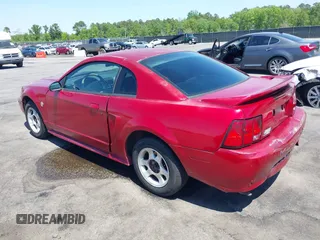 1999 Ford Mustang with VIN 1FAFP4042XF229616, listed as a IAAI auction lot 42047185 with 287,758 mi miles and . Bid and sale history available at DreamBid. Image 3.