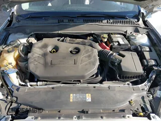 2013 Ford Fusion Titanium with VIN 3FA6P0K92DR200035, listed as a IAAI auction lot 42798129 with 242,831 mi miles and . Bid and sale history available at DreamBid. Image 10.