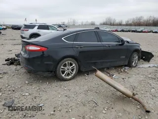 2016 Ford Fusion Titanium Hybrid z VIN 3FA6P0RU6GR139495, wystawiony jako Copart lot #52381235 z przebiegiem 138 534 mil mil oraz Czysty tytuł • Clean title. Historia ofert i sprzedaży dostępna na DreamBid. Obrazek 3.