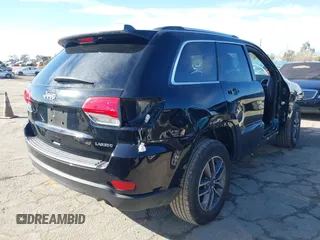 2019 Jeep Grand Cherokee Altitude with VIN 1C4RJEAG7KC852263, listed as a IAAI auction lot 41590946 with 83,356 mi miles and . Bid and sale history available at DreamBid. Image 4.