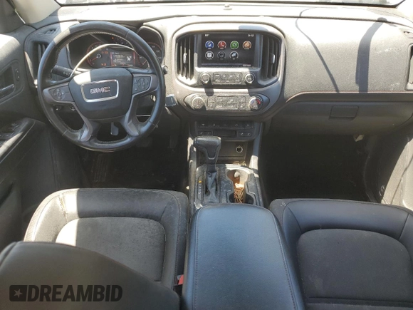 2015 GMC Canyon 4WD SLE with VIN 1GTG6BE32F1115990, listed as a Copart auction lot 71295314 with 118,913 mi miles and Salvage Title. Bid and sale history available at carsss.com. Image 15.