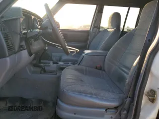 1997 Jeep Cherokee Sport z VIN 1J4FJ68S9VL594832, wystawiony jako Copart lot #53081675 z przebiegiem 167 028 mil mil oraz Czysty tytuł • Clean title. Historia ofert i sprzedaży dostępna na DreamBid. Obrazek 7.