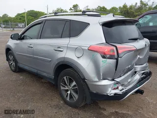 2016 Toyota RAV4 XLE with VIN 2T3WFREV5GW309468, listed as a IAAI auction lot 41973896 with 100,911 mi miles. Bid and sale history available at carsss.com. Image 3.