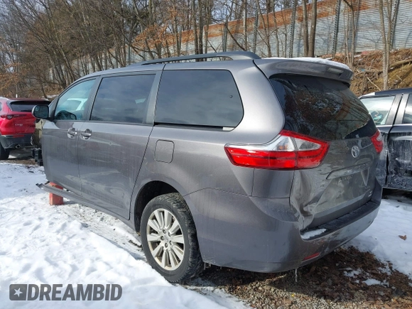 2017 Toyota Sienna LE with VIN 5TDJZ3DC5HS173134, listed as a IAAI auction lot 41256534 with 70,940 mi miles. Bid and sale history available at carsss.com. Image 3.