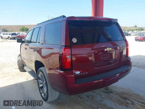 2018 Chevrolet Tahoe LT with VIN 1GNSCBKC5JR385935, listed as a IAAI auction lot 42116288 with 50,890 mi miles and . Bid and sale history available at DreamBid. Image 3.