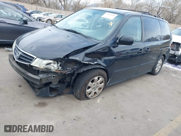 2004 Honda Odyssey EX-L with VIN 5FNRL18914B037976, listed as a IAAI auction lot 41893438 with Not Provided miles and . Bid and sale history available at DreamBid. Image 17.