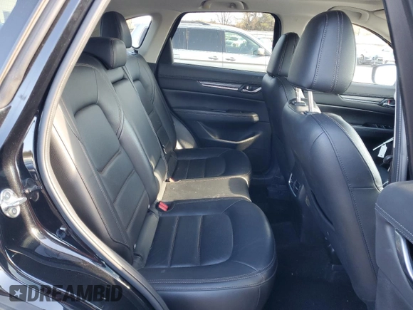 2019 Mazda CX-5 Grand Touring with VIN JM3KFBDM0K0571806, listed as a Copart auction lot 43395105 with 57,768 mi miles and Salvage Title. Bid and sale history available at carsss.com. Image 11.