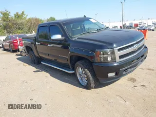 2009 Chevrolet Silverado 1500 with VIN 3GCFK33289G258181, listed as a IAAI auction lot 40572151 with 220,512 mi miles and . Bid and sale history available at DreamBid. Image 1.