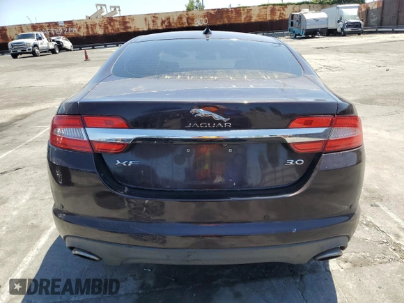 2015 Jaguar XF V6 Portfolio with VIN SAJWA0F79F8U60216, listed as a Copart auction lot 54969245 with 88,954 mi miles and Salvage Title. Bid and sale history available at carsss.com. Image 6.