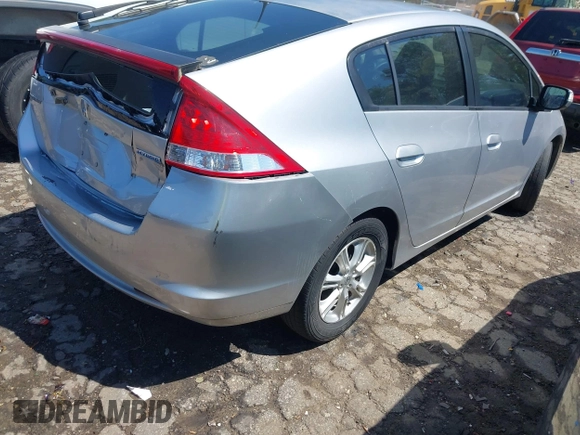 2010 Honda Insight EX with VIN JHMZE2H75AS013109, listed as a IAAI auction lot 41976886 with 226,434 mi miles and . Bid and sale history available at DreamBid. Image 4.