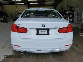 2013 BMW 3 Series 328i with VIN WBA3A5G52DNP18972, listed as a Copart auction lot 58122935 with 209,173 mi miles and Salvage title. Bid and sale history available at DreamBid. Image 7.