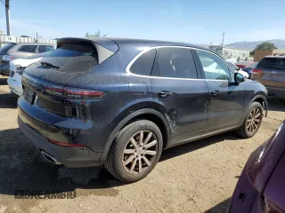 2022 Porsche Cayenne with VIN WP1AA2AY5NDA04335, listed as a Copart auction lot 57320915 with 7,017 mi miles and Salvage title. Bid and sale history available at DreamBid. Image 3.