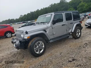 2020 Jeep Wrangler Unlimited Sahara with VIN 1C4HJXEN9LW175636, listed as a Copart auction lot 62836335 with 107,096 mi miles and Salvage title. Bid and sale history available at DreamBid. Image 1.