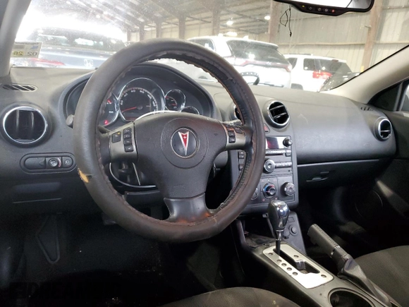 2009 Pontiac G6 GT 1SB z VIN 1G2ZK57K694233980, wystawiony jako Copart lot #54146815 z przebiegiem 96 973 mil mil oraz Szkoda całkowita • Salvage title. Historia ofert i sprzedaży dostępna na DreamBid. Obrazek 8.