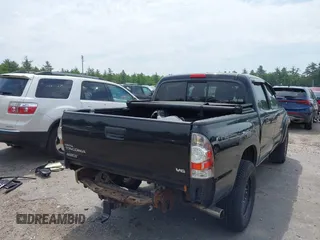 2013 Toyota Tacoma with VIN 3TMLU4EN4DM117239, listed as a IAAI auction lot 42494359 with 239,635 mi miles and . Bid and sale history available at DreamBid. Image 4.