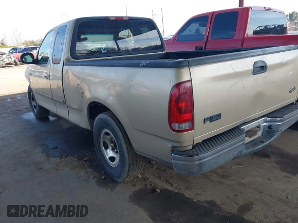 2000 Ford F-150 XL with VIN 1FTZX1723YKB48613, listed as a IAAI auction lot 41611851 with 187,450 mi miles. Bid and sale history available at carsss.com. Image 3.