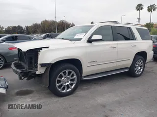 2015 GMC Yukon Denali with VIN 1GKS2CKJ9FR294551, listed as a IAAI auction lot 42162654 with 106,063 mi miles. Bid and sale history available at carsss.com. Image 19.