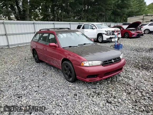 1998 Subaru Legacy L with VIN 4S3BK4350W6308826, listed as a Copart auction lot 71891284 with 134,419 mi miles and Salvage title. Bid and sale history available at DreamBid. Image 11.