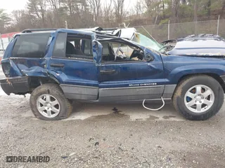 2002 Jeep Grand Cherokee Laredo with VIN 1J4GW48S82C321712, listed as a IAAI auction lot 41855809 with 1 mi miles. Bid and sale history available at carsss.com. Image 13.
