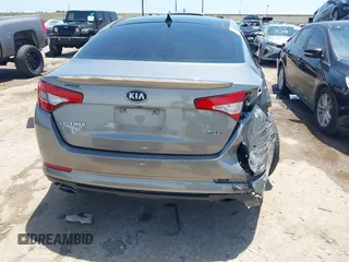 2013 Kia Optima SX with VIN 5XXGR4A67DG199714, listed as a IAAI auction lot 42359527 with 133,636 mi miles and . Bid and sale history available at DreamBid. Image 16.