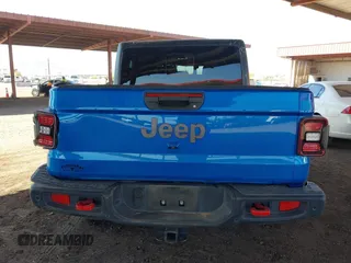 2021 Jeep Gladiator Rubicon with VIN 1C6JJTBGXML516164, listed as a IAAI auction lot 41837544 with 48,197 mi miles and . Bid and sale history available at DreamBid. Image 15.