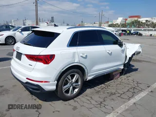 2021 Audi Q3 S line Premium with VIN WA1DECF37M1055948, listed as a IAAI auction lot 42141007 with 48,763 mi miles and . Bid and sale history available at DreamBid. Image 4.