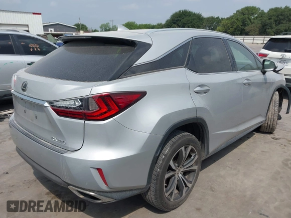 2017 Lexus RX 350 z VIN 2T2ZZMCAXHC052984, wystawiony jako IAAI lot #42273947 z przebiegiem 128 019 mil mil oraz . Historia ofert i sprzedaży dostępna na DreamBid. Obrazek 4.