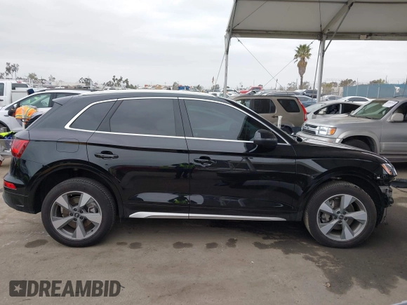 2023 Audi Q5 Premium Plus z VIN WA1BBAFY7P2187588, wystawiony jako IAAI lot #42052046 z przebiegiem 18 987 mil mil oraz . Historia ofert i sprzedaży dostępna na DreamBid. Obrazek 14.