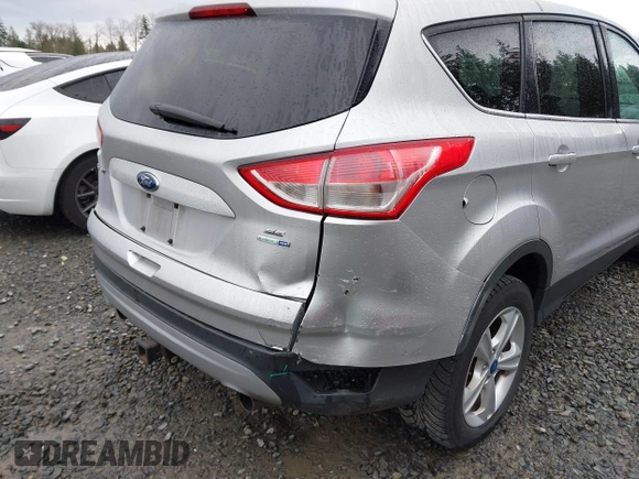 2013 Ford Escape SE with VIN 1FMCU9G94DUC37269, listed as a IAAI auction lot 41896473 with 130,391 mi miles. Bid and sale history available at carsss.com. Image 6.