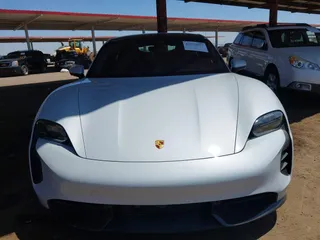 2021 Porsche Taycan Turbo z VIN WP0AC2Y1XMSA63835, wystawiony jako IAAI lot #42579977 z przebiegiem 5 841 mil mil oraz . Historia ofert i sprzedaży dostępna na DreamBid. Obrazek 6.