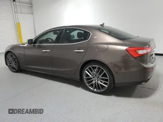 2016 Maserati Ghibli S Q4 z VIN ZAM57RTA4G1168220, wystawiony jako Copart lot #57850955 z przebiegiem 126 378 mil mil oraz Tytuł czysty. Historia ofert i sprzedaży dostępna na DreamBid. Obrazek 2.