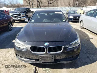 2018 BMW 3 Series 320i xDrive with VIN WBA8E5G58JNU47907, listed as a Copart auction lot 47214105 with 68,631 mi miles and Salvage Title. Bid and sale history available at carsss.com. Image 5.