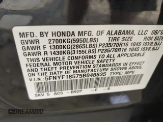 2005 Honda Pilot EX-L with VIN 5FNYF18575B046635, listed as a IAAI auction lot 42096210 with 222,490 mi miles and . Bid and sale history available at carsss.com. Image 9.
