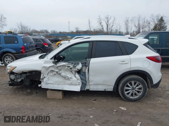 2014 Mazda CX-5 Sport with VIN JM3KE2BE8E0422322, listed as a IAAI auction lot 42009499 with 166,966 mi miles and . Bid and sale history available at carsss.com. Image 15.