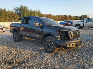 2019 Nissan Titan Pro-4X z VIN 1N6AA1E53KN525603, wystawiony jako Copart lot #77336264 z przebiegiem 64 507 mil mil oraz Szkoda całkowita • Salvage title. Historia ofert i sprzedaży dostępna na DreamBid. Obrazek 4.