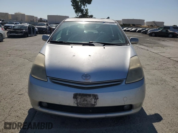 2005 Toyota Prius z VIN JTDKB20U557022396, wystawiony jako Copart lot #59750095 z przebiegiem 263 673 mil mil oraz Szkoda całkowita • Salvage title. Historia ofert i sprzedaży dostępna na DreamBid. Obrazek 5.