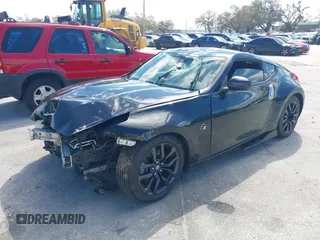 2017 Nissan 370Z with VIN JN1AZ4EH5HM954458, listed as a IAAI auction lot 41629907 with 113,606 mi miles. Bid and sale history available at carsss.com. Image 17.