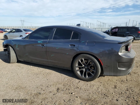2021 Dodge Charger Scat Pack Widebody with VIN 2C3CDXGJ1MH677850, listed as a Copart auction lot 49909025 with 104,332 mi miles and Salvage Title. Bid and sale history available at carsss.com. Image 2.
