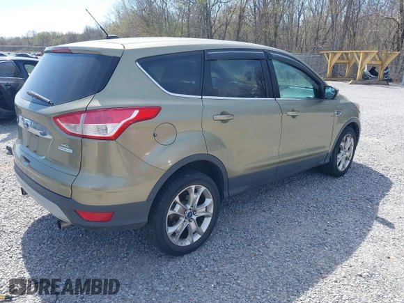 2013 Ford Escape SEL with VIN 1FMCU0HX3DUB37785, listed as a IAAI auction lot 41863069 with 179,508 mi miles. Bid and sale history available at carsss.com. Image 4.