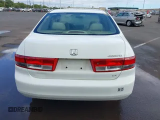 2004 Honda Accord LX with VIN JHMCM56344C005690, listed as a IAAI auction lot 41360785 with 132,915 mi miles and . Bid and sale history available at DreamBid. Image 16.