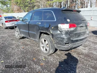 2014 Jeep Grand Cherokee Limited with VIN 1C4RJFBG3EC153236, listed as a IAAI auction lot 41858900 with 151,361 mi miles and . Bid and sale history available at DreamBid. Image 3.