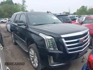 2017 Cadillac Escalade Luxury z VIN 1GYS3BKJ4HR348466, wystawiony jako IAAI lot #40900327 z przebiegiem 85 306 mil mil oraz . Historia ofert i sprzedaży dostępna na DreamBid. Obrazek 1.